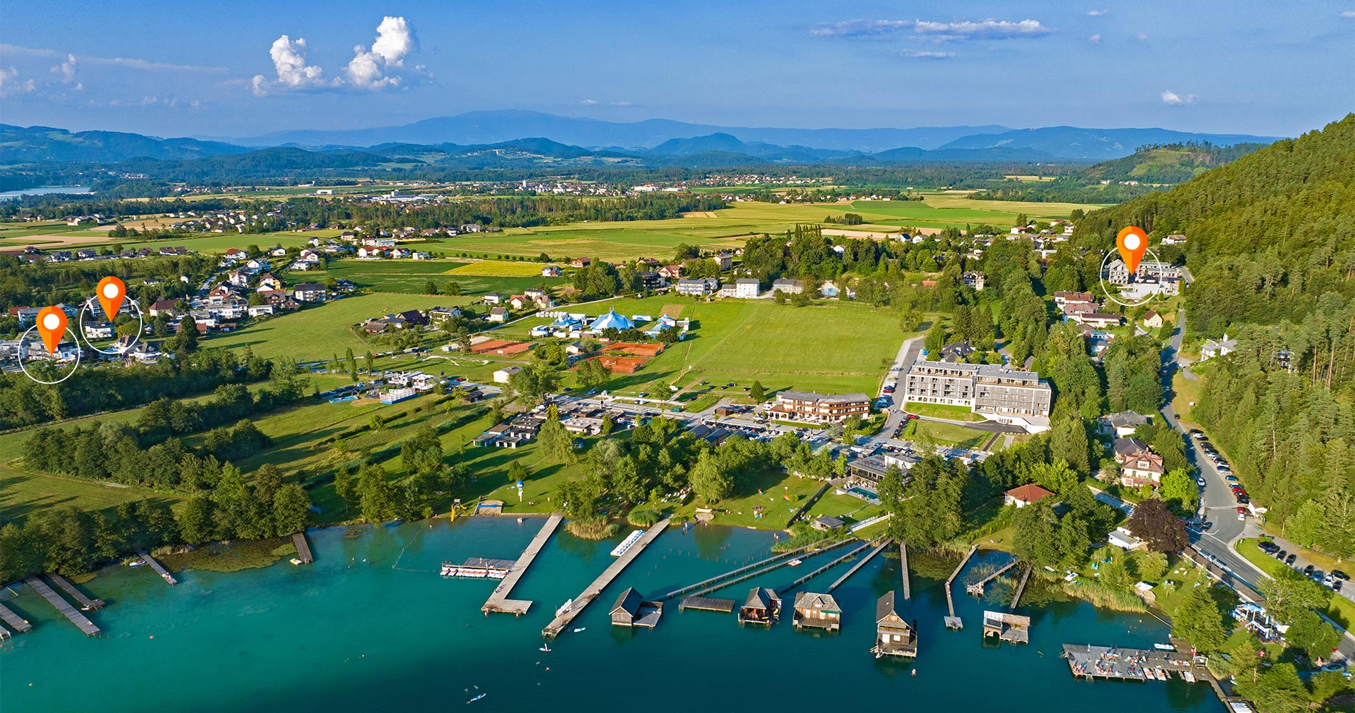 Panorama Klopeiner See Ostufer – Luftaufnahme mit 3 Standorten der Ferienwohnungen an Kärntens wärmstem Badesee